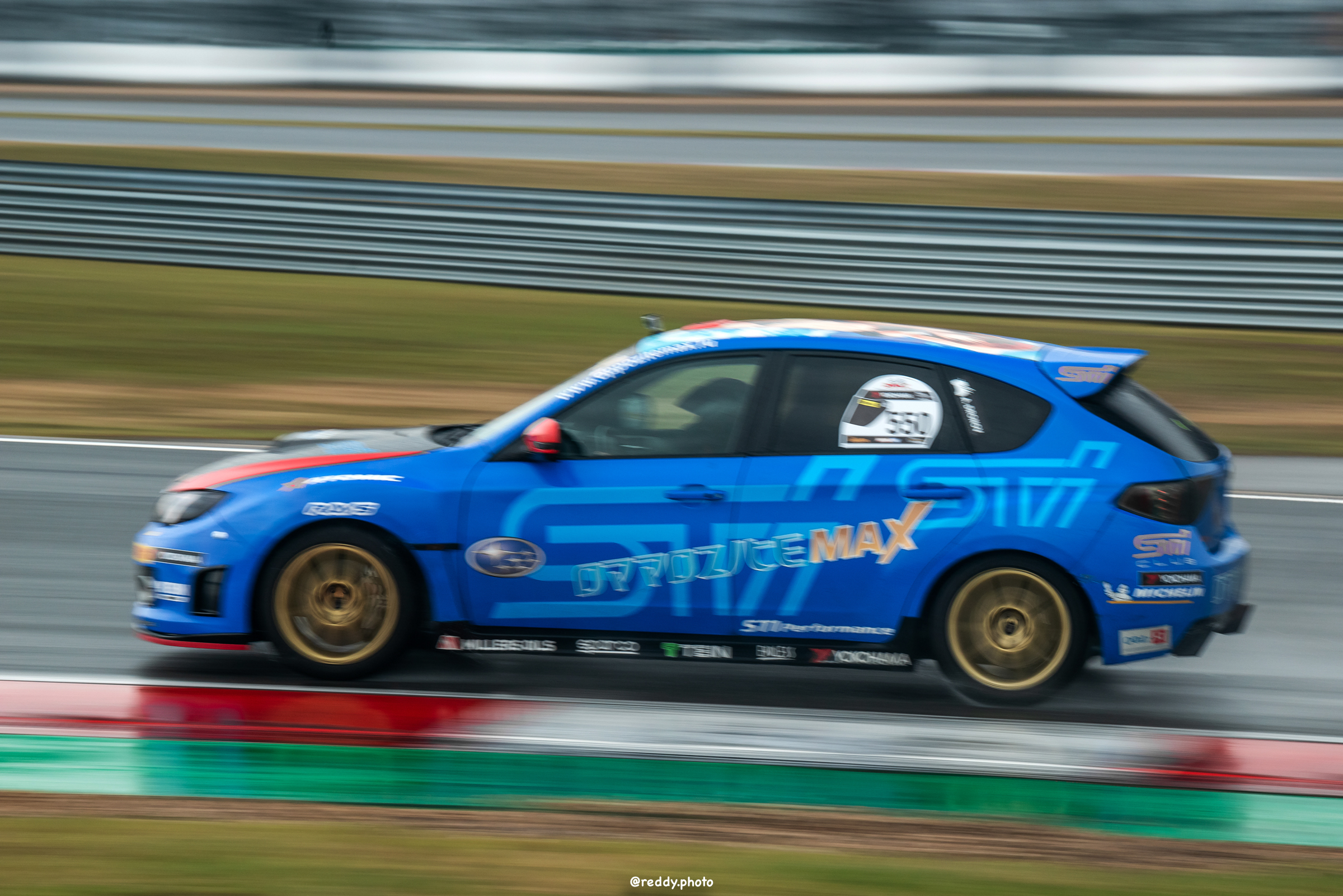 Синяя Impreza III на трассе
