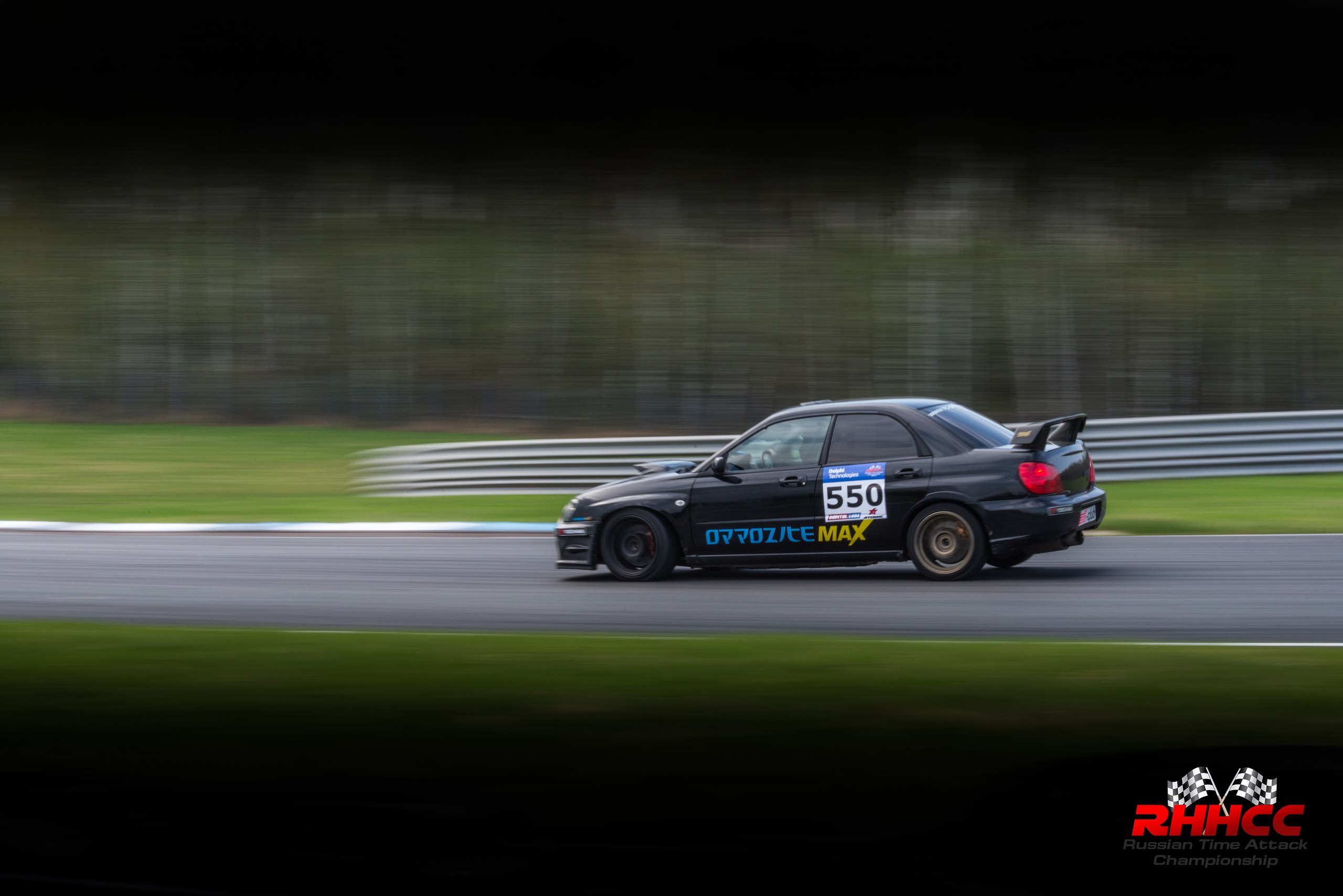 Чёрная Subaru Impreza II на автодроме