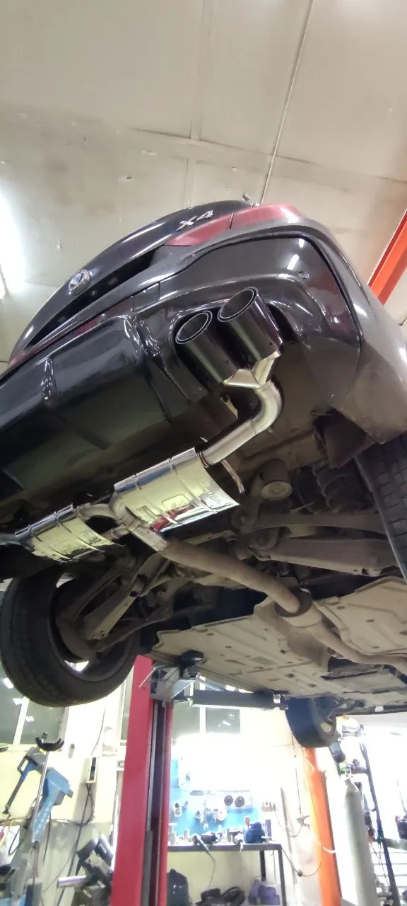 Задняя часть выхлопа с переключением режимов звучания — BMW X4 · 2014–2018 · F26. Фото 3