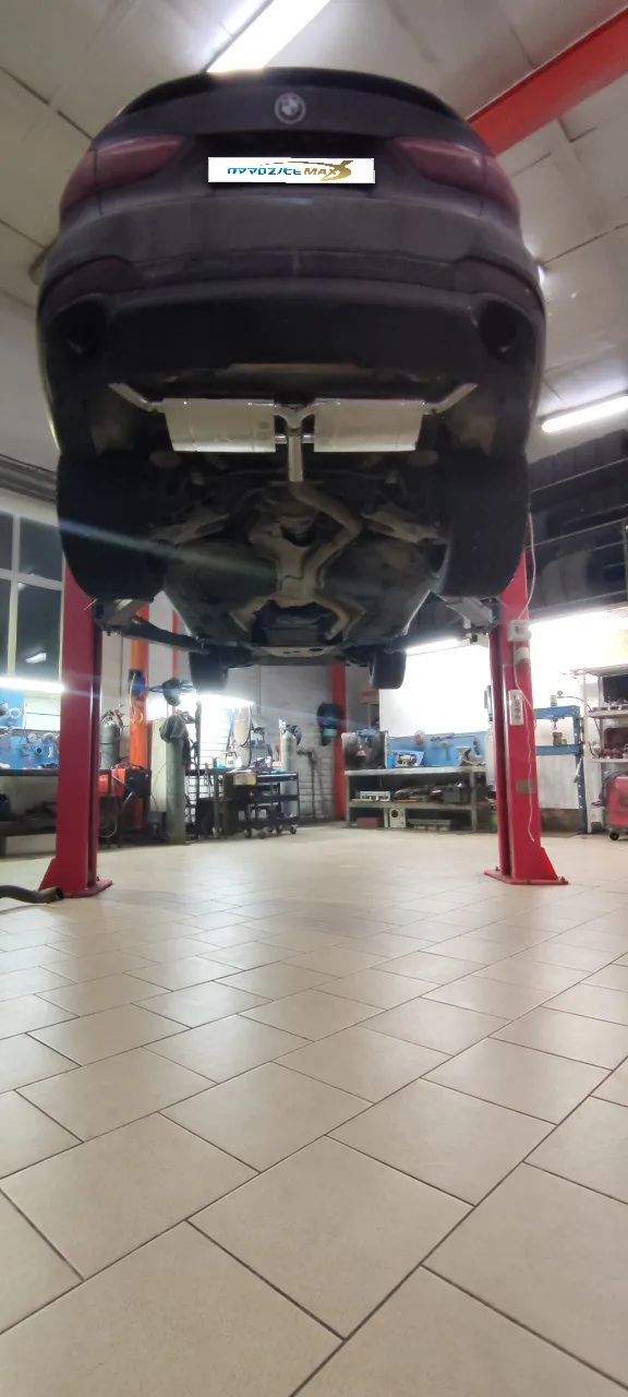 Приёмные трубы (даунпайпы) и задняя часть выхлопа с заслонками — BMW X5 · 2014–2018 · F15. Фото 6