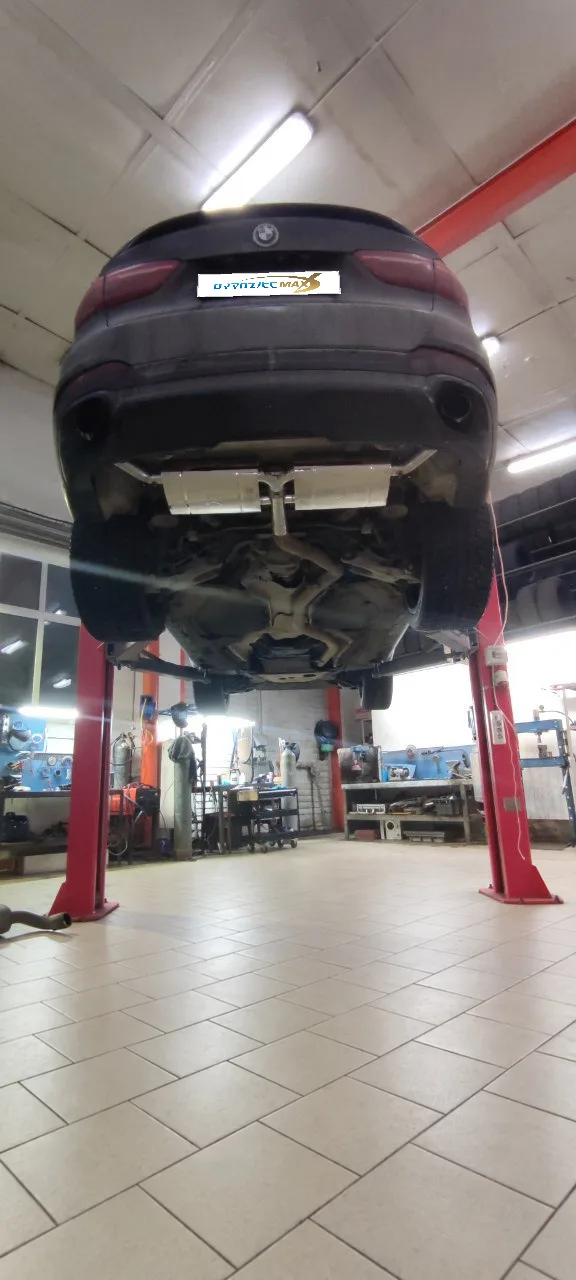 Приёмные трубы (даунпайпы) и задняя часть выхлопа с заслонками — BMW X5 · 2014–2018 · F15. Фото 8