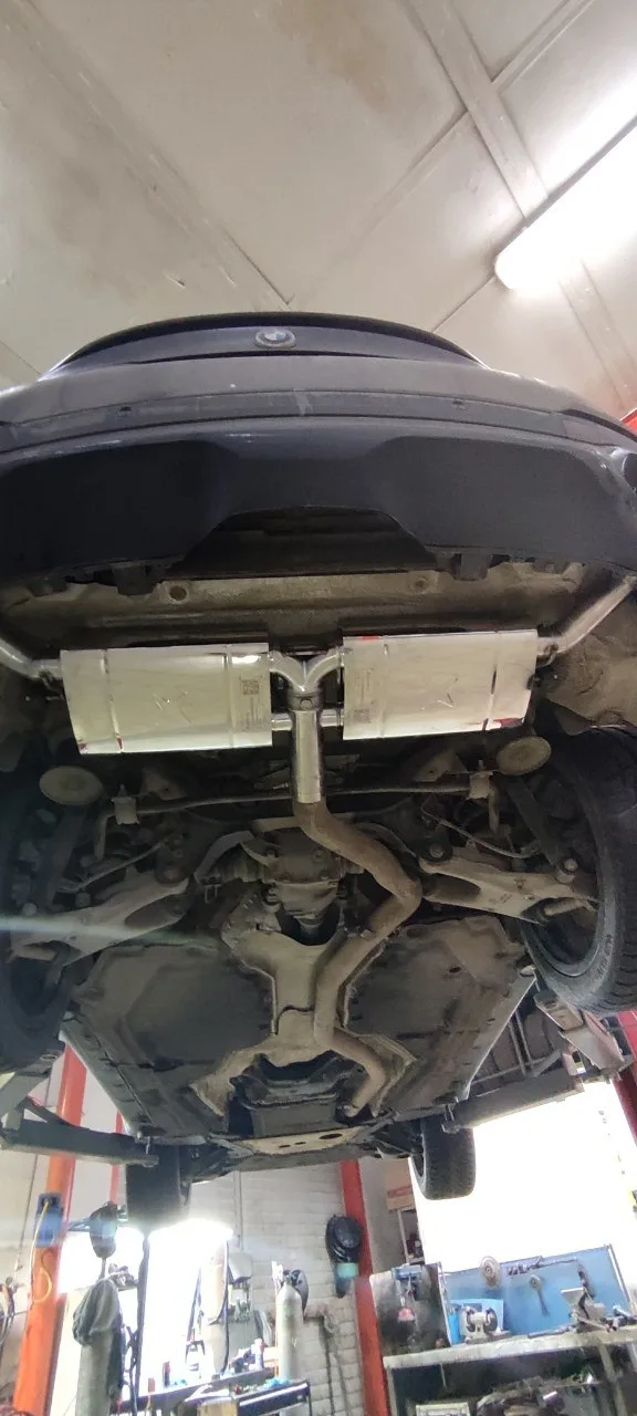 Приёмные трубы (даунпайпы) и задняя часть выхлопа с заслонками — BMW X5 · 2014–2018 · F15. Фото 10